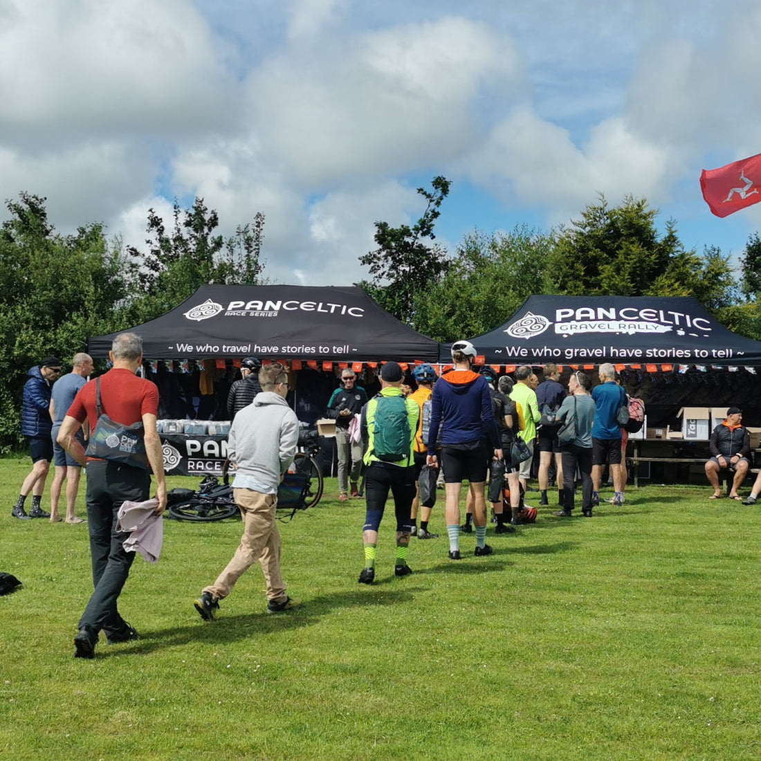 Line of people queue in front of Pan Celtic tents